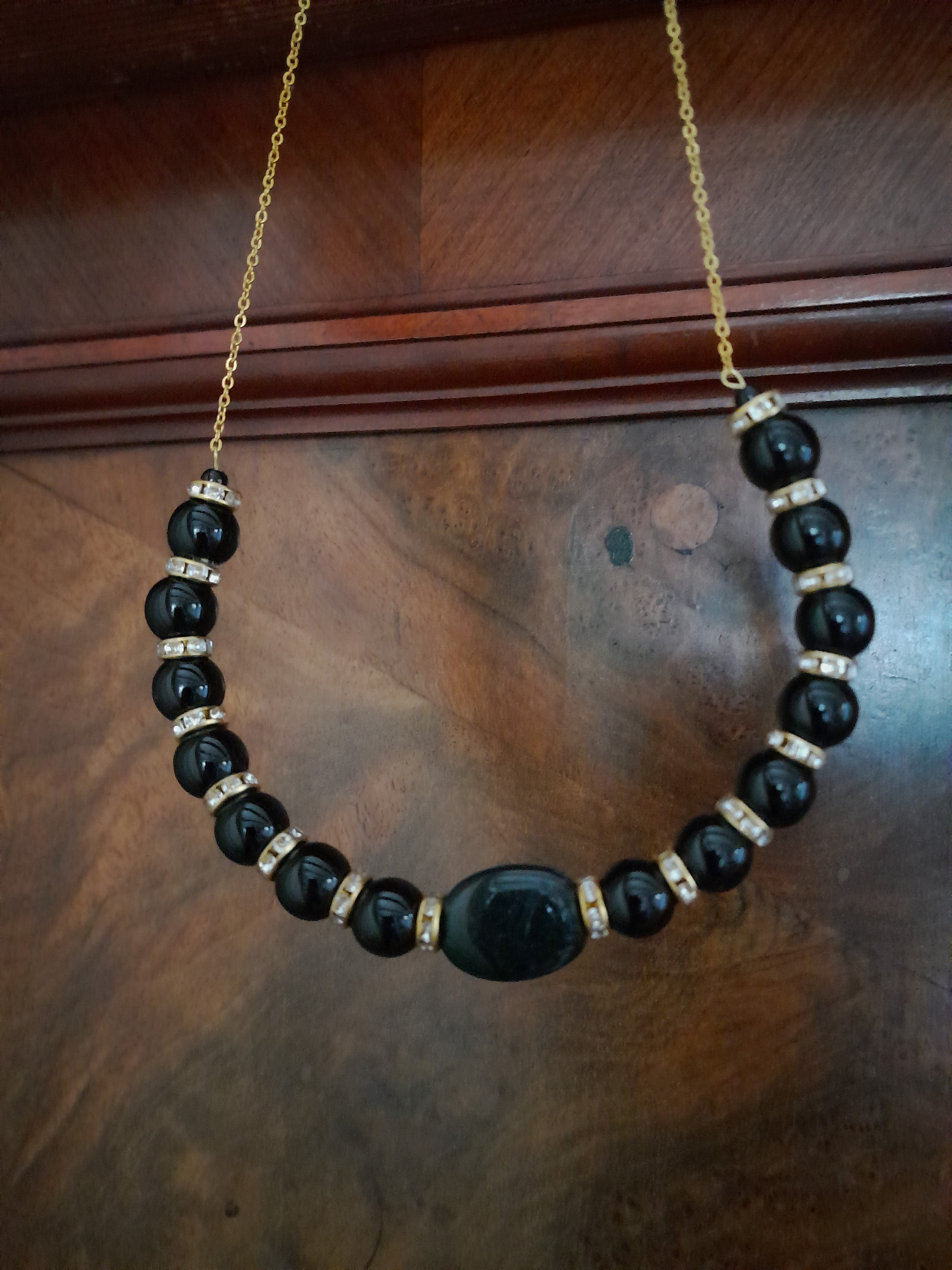 Halskette in Schwarz und Gold Halskette in Schwarz und Gold